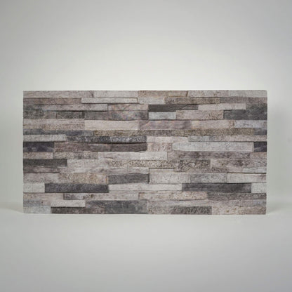 Onyx 3D faux stacked stone styrofoam wall panel with cool grey tones