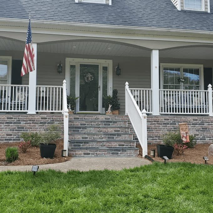 Customer photo: Earthcore faux brick on a porch foundation and steps