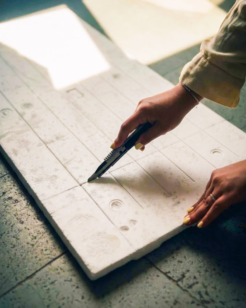 Scoring a panel with a utility knife